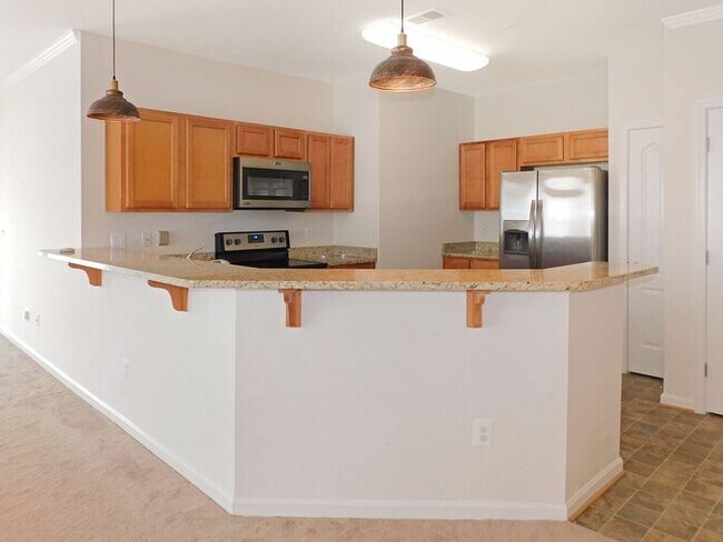 Foto del edificio - Pet Friendly Condo with Private Balcony and 1 Car Garage