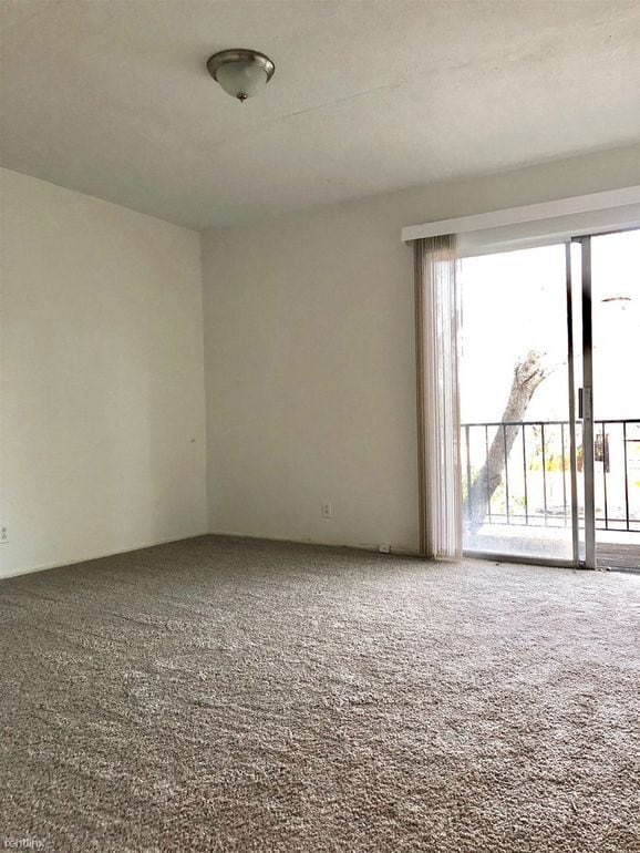 Bedroom upstairs with Balcony. - 1338 Churing Dr
