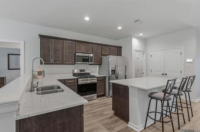 Building Photo - Modern 3 Bedroom Home with Private Backyard Views in Forestwood