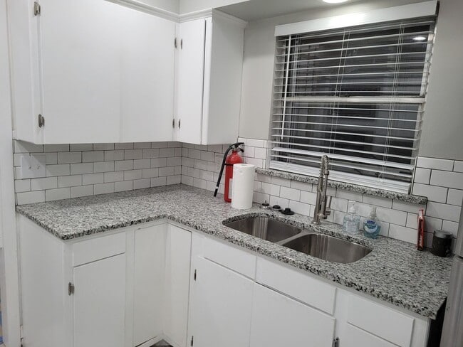 Building Photo - Remodeled 3 bedroom 2 bathroom house with 2 car garage and fenced yard