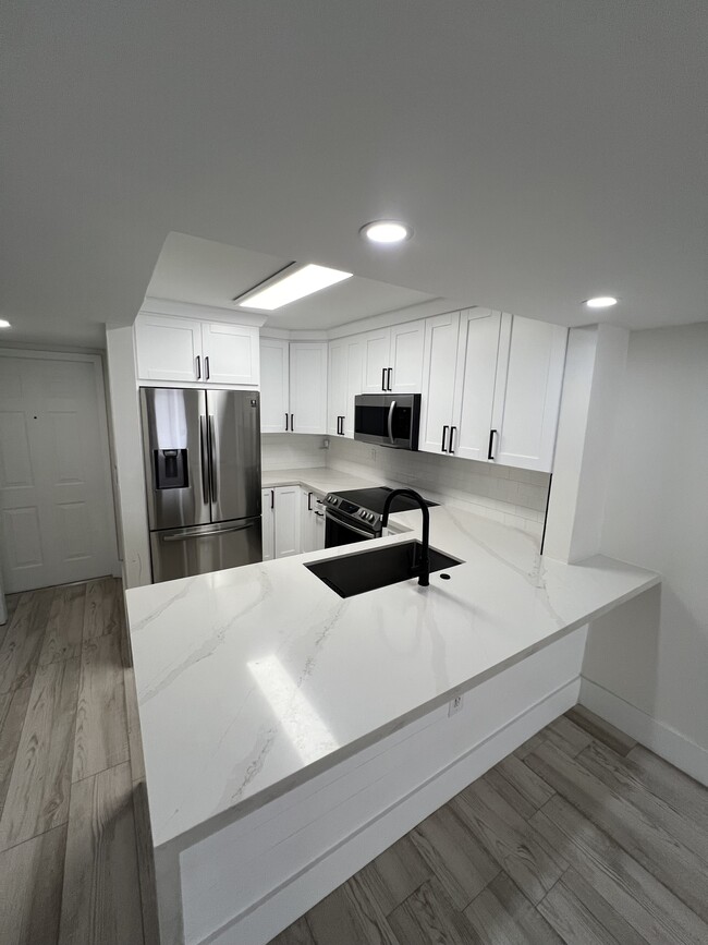 Modern - Quartz Kitchen with stainless steel appliances - 4600 SW 67th Ave