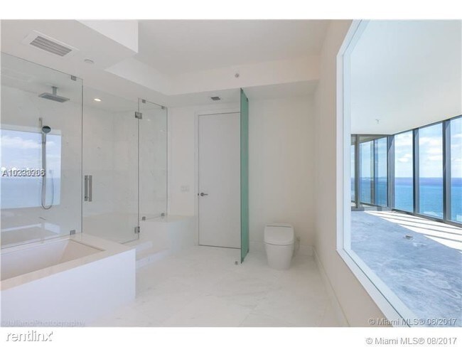 Building Photo - 18555 Collins Ave