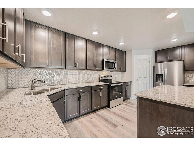Building Photo - Brand New 3Br/2Ba Condo with 2-Car Garage