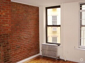 Building Photo - 411 E 12th St