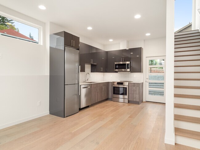 Large living area facing kitchen - 3711 S Dakota St
