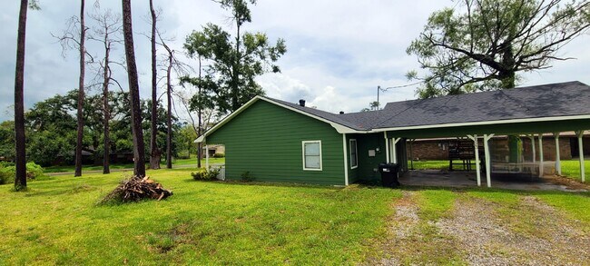 Side yard and carport - 2523 Miller Ave