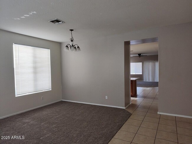 Building Photo - 16181 W Gelding Dr