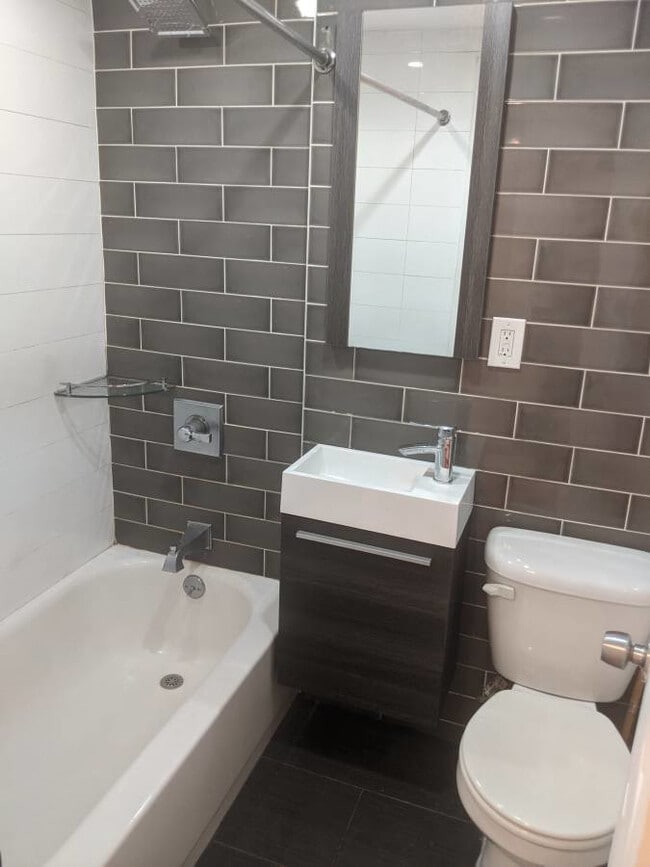 Building Photo - 2166 Frederick Douglass Blvd #2f