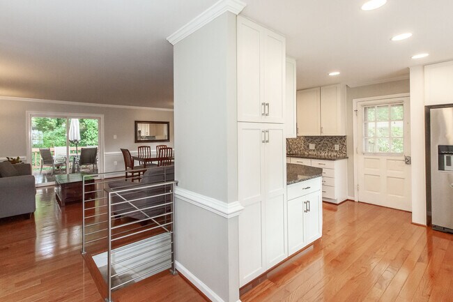 Open concept. View from the foyer. - 8636 Woodview Dr