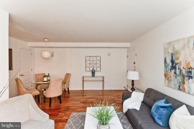 Living Room Area Opens To Dining Area - 1031 Michigan Ave NE