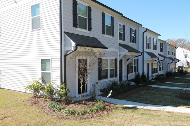 Building Photo - NEW 3 Bedroom Townhome Minutes from Downto...