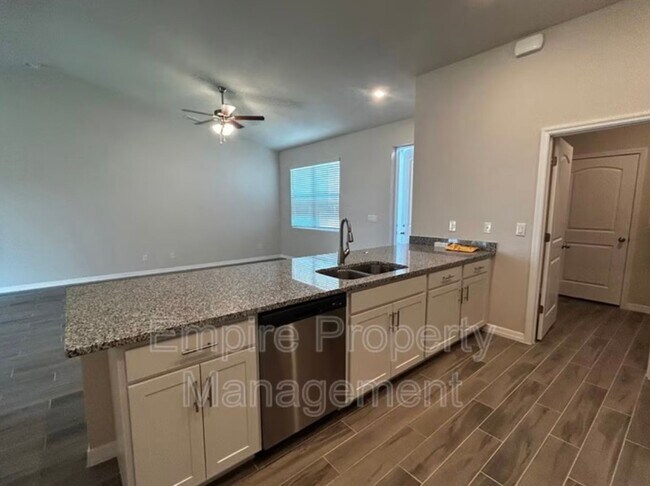 Building Photo - COMING MID-JUNE! 4 Bed 2 Bath 3 Car Garage with Screened Lanai
