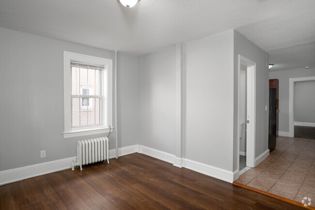 1BR, 1BA - 605SF - Living room - Residences at Barry Square