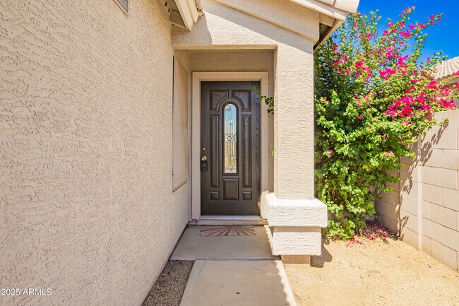 Building Photo - 8638 W Mauro Ln