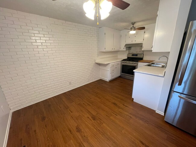 dining area and kitchen - 2495 North Rd NE