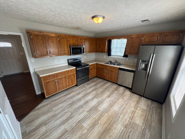 Foto del edificio - "Cozy Comfort Awaits: Charming 2-Bedroom Home in Oak Grove!"