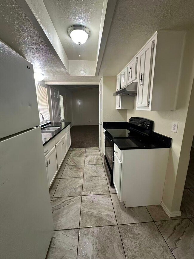 Foto del edificio - 3 Bedroom House in Garland