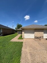 Building Photo - 6440-6442 Woodbeach Dr