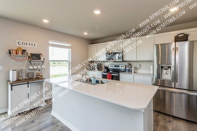 Building Photo - EXECUTIVE IN WAUKEE!! 4 Bedroom, 2.5 Bathr...