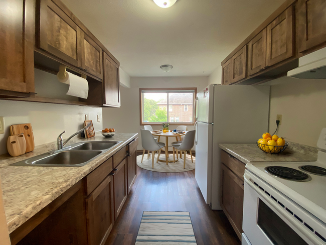 Virtually Staged Kitchen/Dining Room - University Terrace Apartments