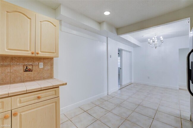 Building Photo - 4 br, 2 bath House - 6410 SW 2nd St # A