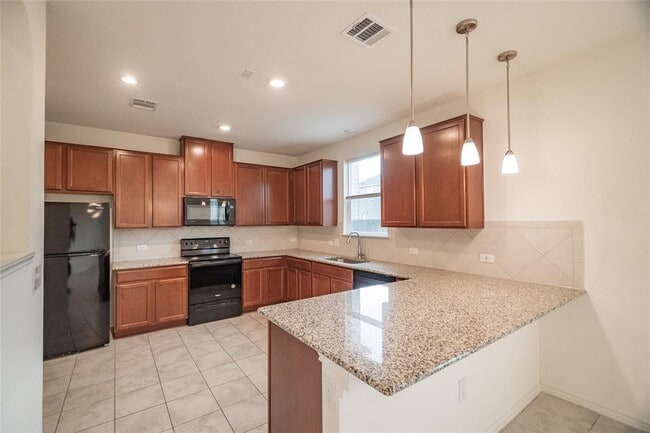 Foto del edificio - 6412 Carriage Pines Dr