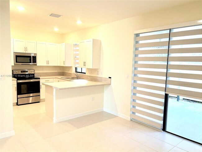 Foto del edificio - 11088 W 33rd Way