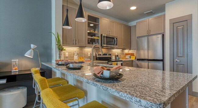 Building Photo - Unwind in Our Stylish 1 Bedroom Apartments