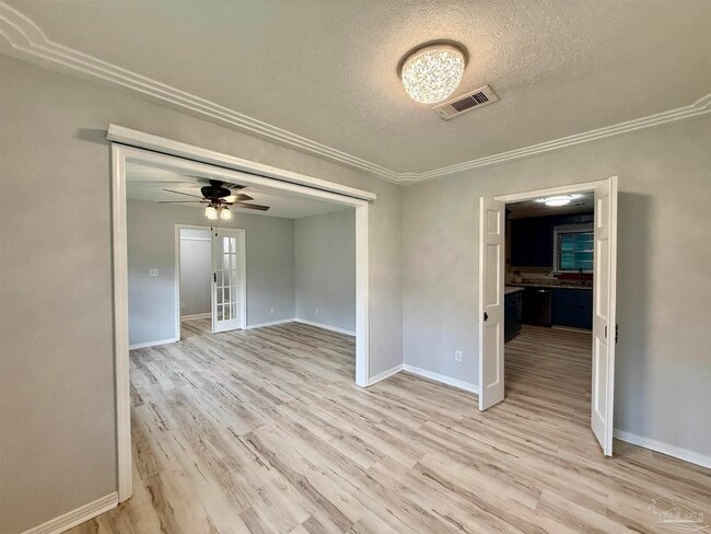 Building Photo - 9681 Pine Cone Dr