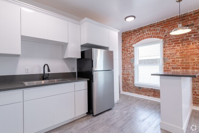 Building Photo - Newly Remodeled Units with Brick Exposure