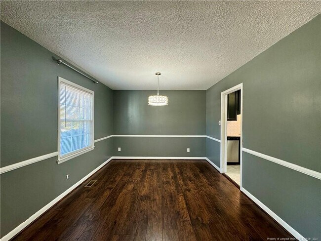 Building Photo - 5707 McDougal Dr