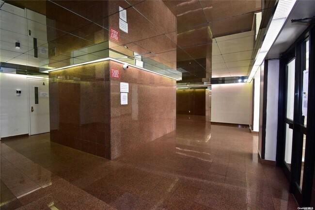Building Photo - 94-31-94-59 59th Ave