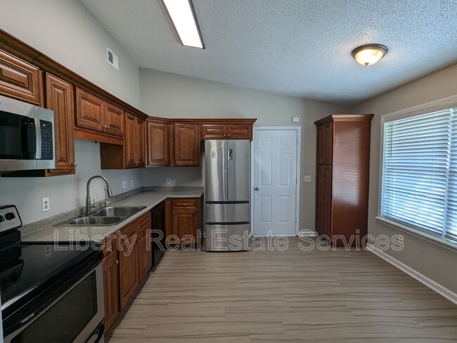 Foto del edificio - 628 Honey Ridge Ln
