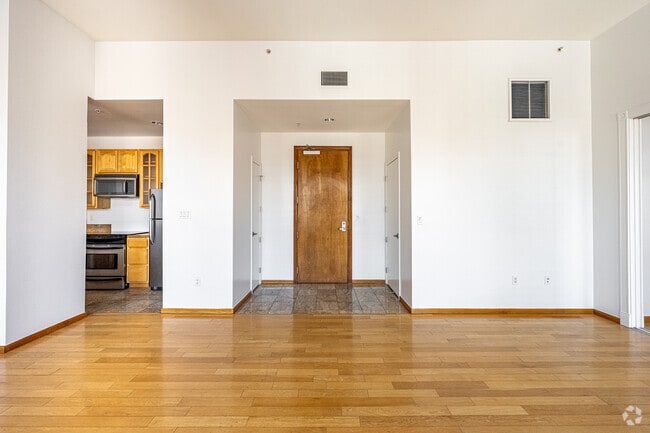 1BR, 1BA - 945SF - LIVING ROOM - Spring Arcade Building