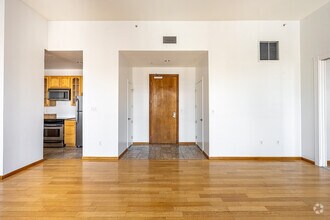 1BR, 1BA - 945SF - LIVING ROOM - Spring Arcade Building