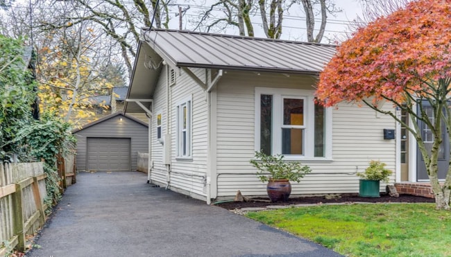 Building Photo - Charming 2 Bedroom 1 Bathroom Bungalow with Oversized 1 Car Garage and Large Manicured  Backyard ...