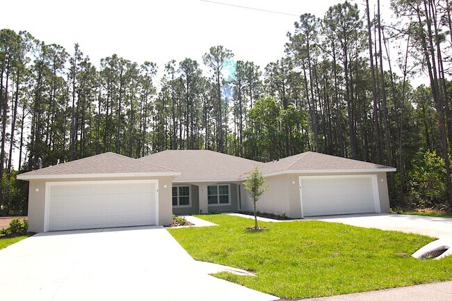 Building Photo - Spacious 4 Bed 2 Bath 2 Car Townhome Built in 2022 in Palm Coast!