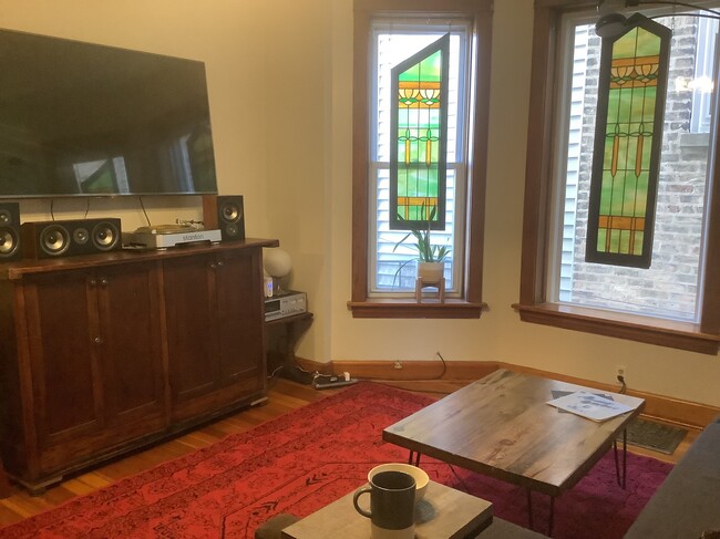 Living Room with TV and Stereo. Stained Glass Panels - 1913 N. Kimball Ave