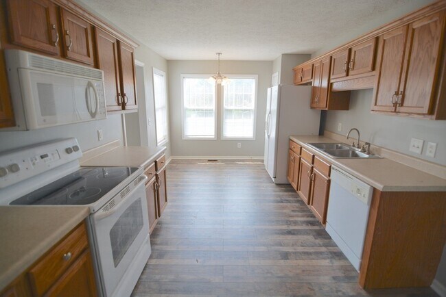 Building Photo - Amazing Home With Fireplace and Bonus Room...
