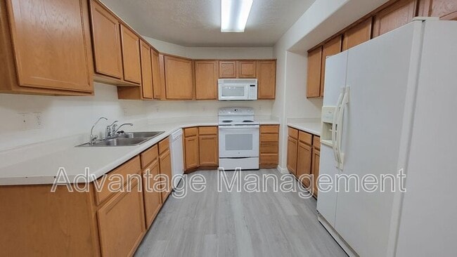 Building Photo - 8083 N Ridge Loop E