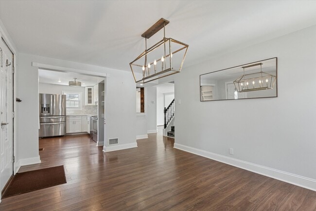 Dining Area into Kitchen and Living Room - 404 Exton Rd
