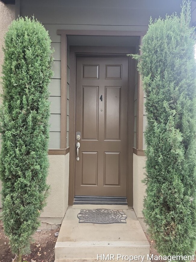 Foto del edificio - Modern 2-Bedroom Condo Near Victoria Gardens