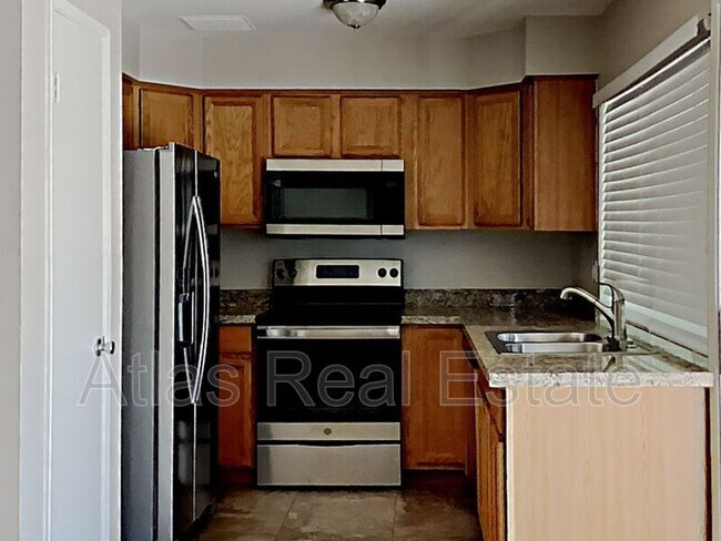 Building Photo - 9855 N 56th Dr