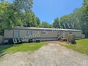 Building Photo - 1618 E Farm Rd 92