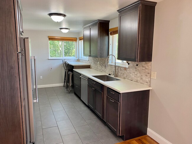 Building Photo - University Gem with Spacious Yard & Garage...