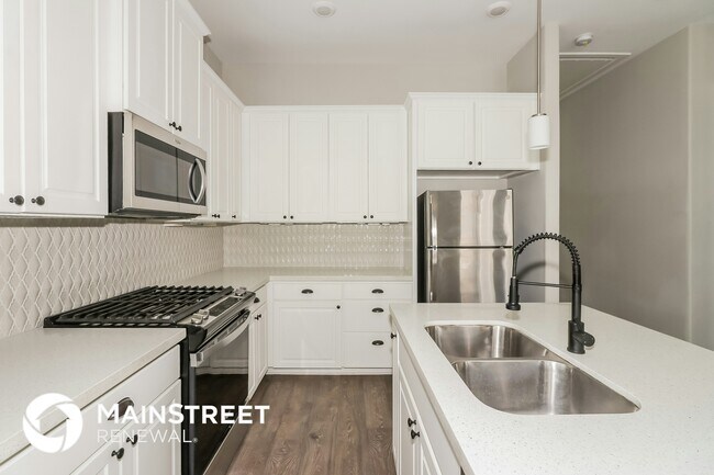 Foto del edificio - 5116 Royal Heath Dr