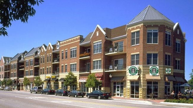 Building Photo - Shops at Village Centre Apartments