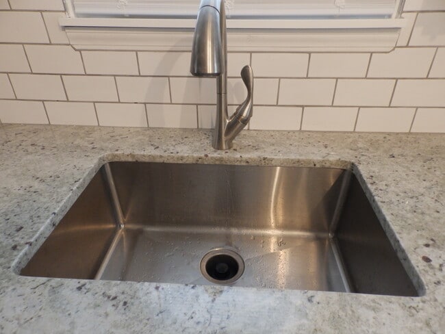 grainte with farm sink - 10008 W 95th St