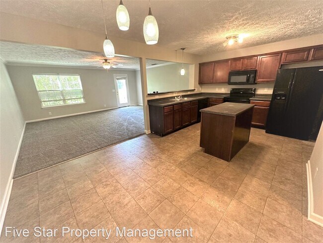 Building Photo - 2 br, 2.5 bath House - 4832 Laura Jeanne Blvd