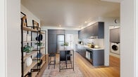 Located at 2365 NE Conners Ave in Bend, Oregon, this thoughtfully designed one-bedroom, one-bathroom unit offers a smart, modern layout across a single floor. Light hardwood flooring flows throughout, complementing a bright, neutral palette that maximizes the sense of space.

The open-concept kitchen is a standout feature, showcasing floor-to-ceiling matte gray cabinetry, white countertops, a white tile backsplash, stainless steel appliances including a full-size refrigerator and dishwasher, and recessed lighting. A freestanding dining table with bar seating bridges the kitchen and living area seamlessly.

The living room benefits from a large window that brings in generous natural light and connects to a compact dining nook. The space is well-proportioned and versatile, with clean wall lines and warm tones throughout.

The bedroom is a comfortable, well-lit retreat with a window overlooking greenery, light hardwood floors, and a dedicated closet. The combined bathroom and laundry room is efficiently designed, featuring a tub-shower combination, wall-mounted sink, a full-length mirror, and a stacked washer and dryer unit conveniently tucked behind a sliding door. A private patio completes the unit, offering outdoor access.